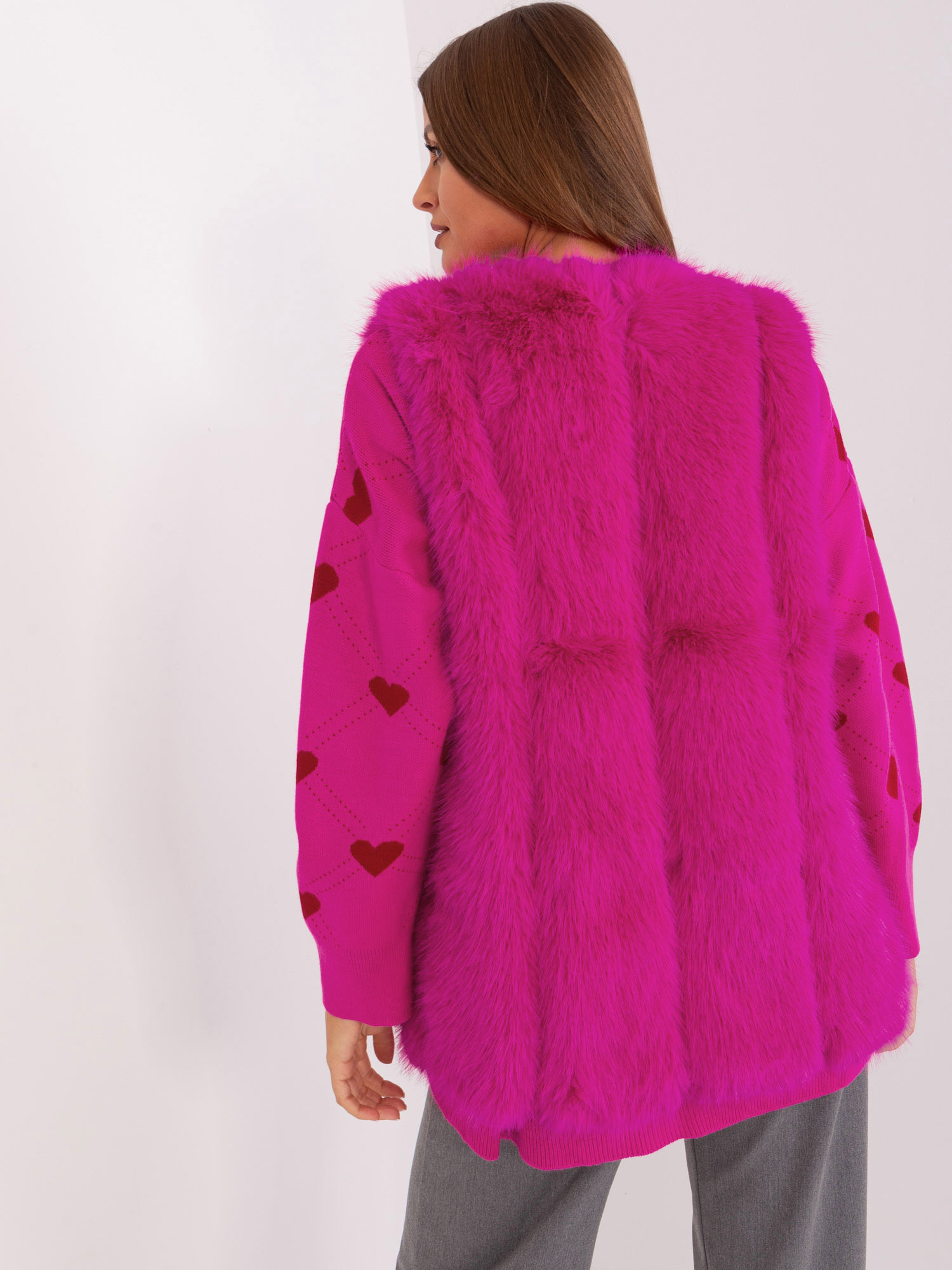 Großhandel Fuchsia Weste aus Kunstpelz.