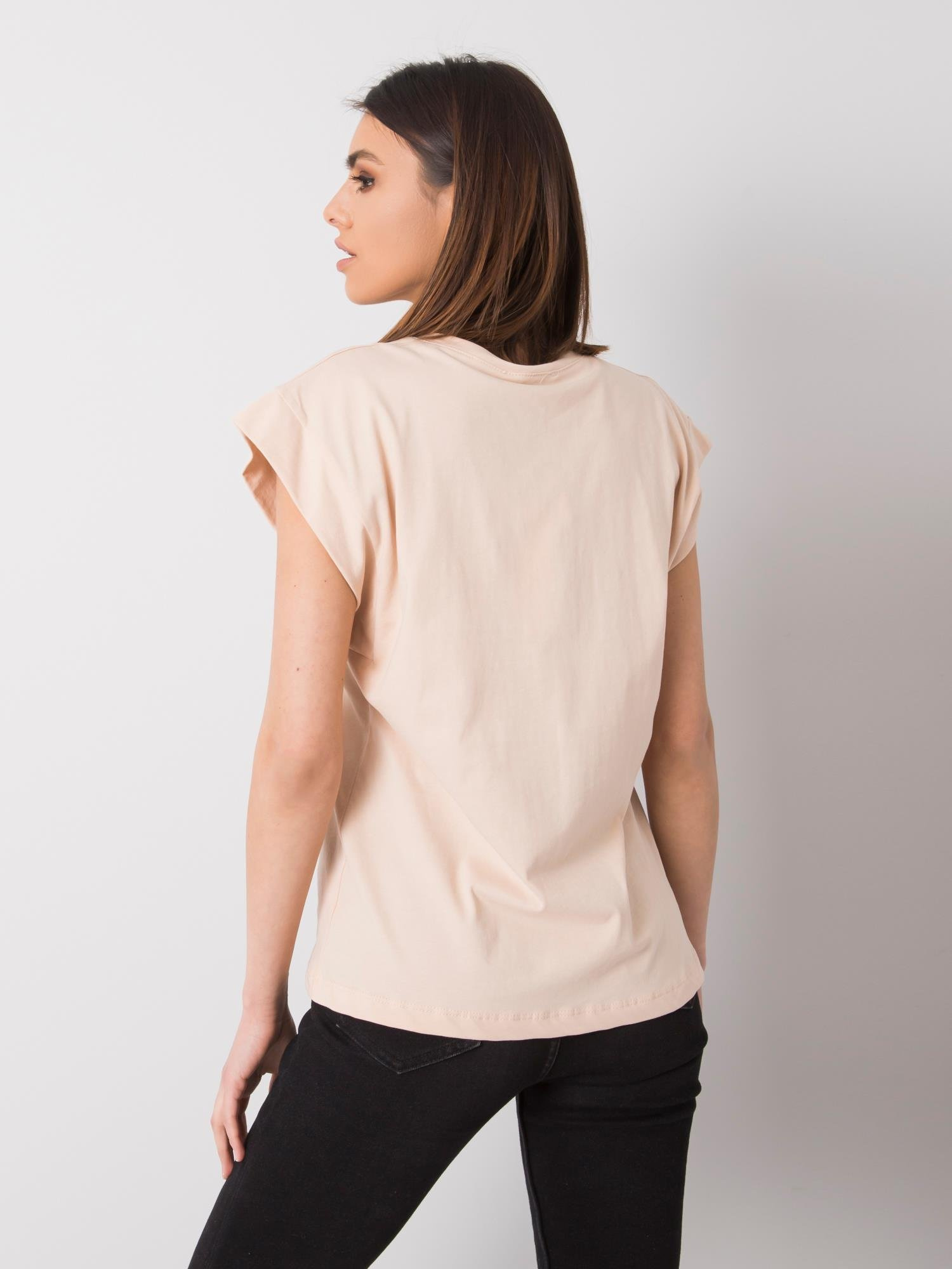 Pfirsichfarbenes T-Shirt mit dem Aufdruck Ciara RUE PARIS.