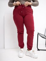 Bordové teplákové kalhoty plus size s kapsami.