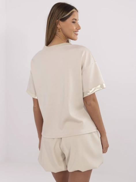 Beżowa damska bluzka z nadrukiem kota