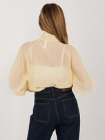 Jasnożółta damska koszula z długimi mankietami