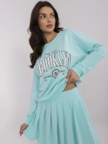 Miętowy damski komplet z bluzą z nadrukiem