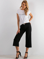 Czarne jeansy Reasons