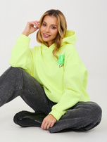 Fluo gelbe Damenbluse mit 3D-Schriftzügen.