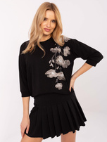 Hurt Czarna damska bluzka z aplikacją z dżetów 