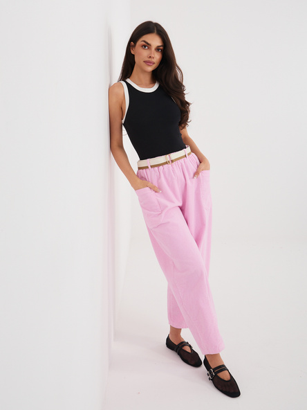 Pastelowe różowe sztruksowe spodnie bez zapięcia