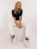 Ecru ocieplane spodnie dresowe ze ściągaczem