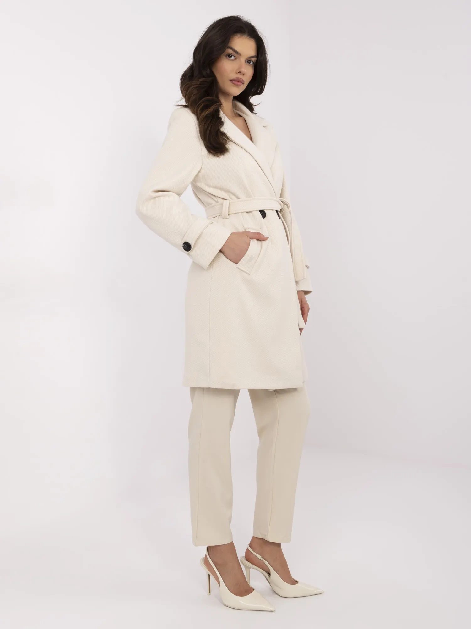Light beige women's knee-length coat.