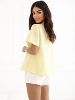 Jasnożółta damska bluzka z zapięciem na haftki 