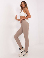 Hurt Ciemnobeżowe legginsy sportowe push-up