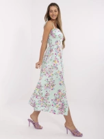 Mint long dress with tied straps.
