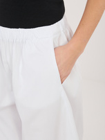 Białe spadochronowe spodnie bez zapięcia RUE PARIS 