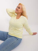 Hurtownia Jasnożółta bluzka plus size z naszywką 