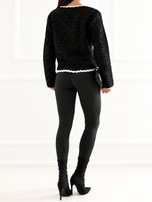 Black elegant cardigan with golden thread.