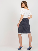 Hurt Ecru-navy cocktail dress off-the-shoulder with a belt.