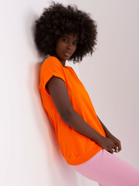 Hurt Pomarańczowa bluzka z transparentną wstawką