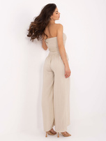 Beige bandeau jumpsuit with pockets.