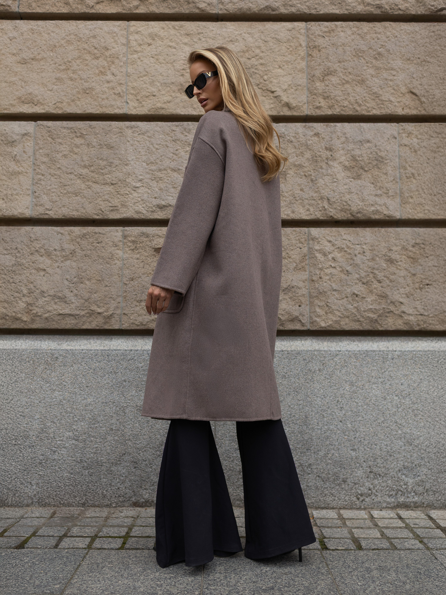 Fango women's oversized coat with patch pockets.
