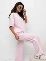 Jasnoróżowe dresowe spodnie z wiązaniem 