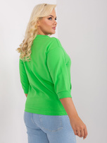 Hurtownia Jasnozielona damska bluzka plus size ze ściągaczem