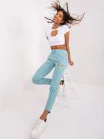 Hurtownia Pistacjowe spodnie dresowe z kieszeniami