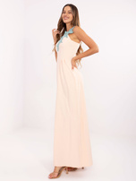 Peach evening dress with straps.