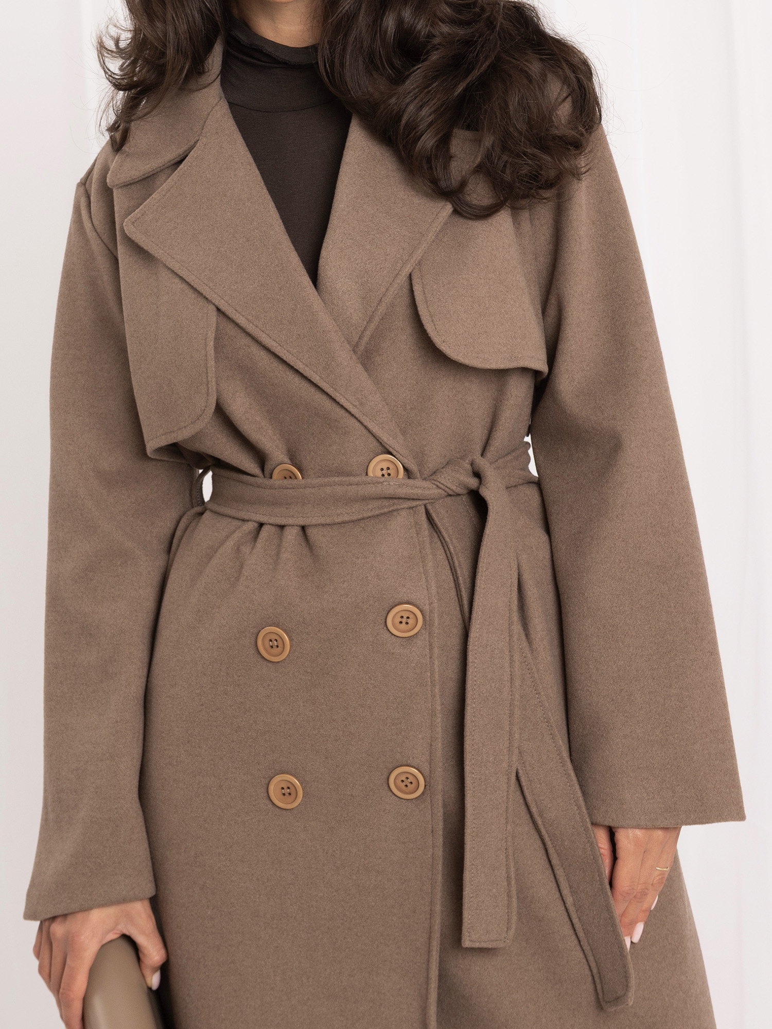 Dark beige long trench coat.