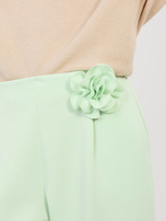 Pastelowe zielone dresowe spodnie bez zapięcia 