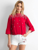 Weiße Shorts mit Blumendesign.