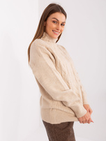 Hurt Beżowy sweter w warkoczowy splot