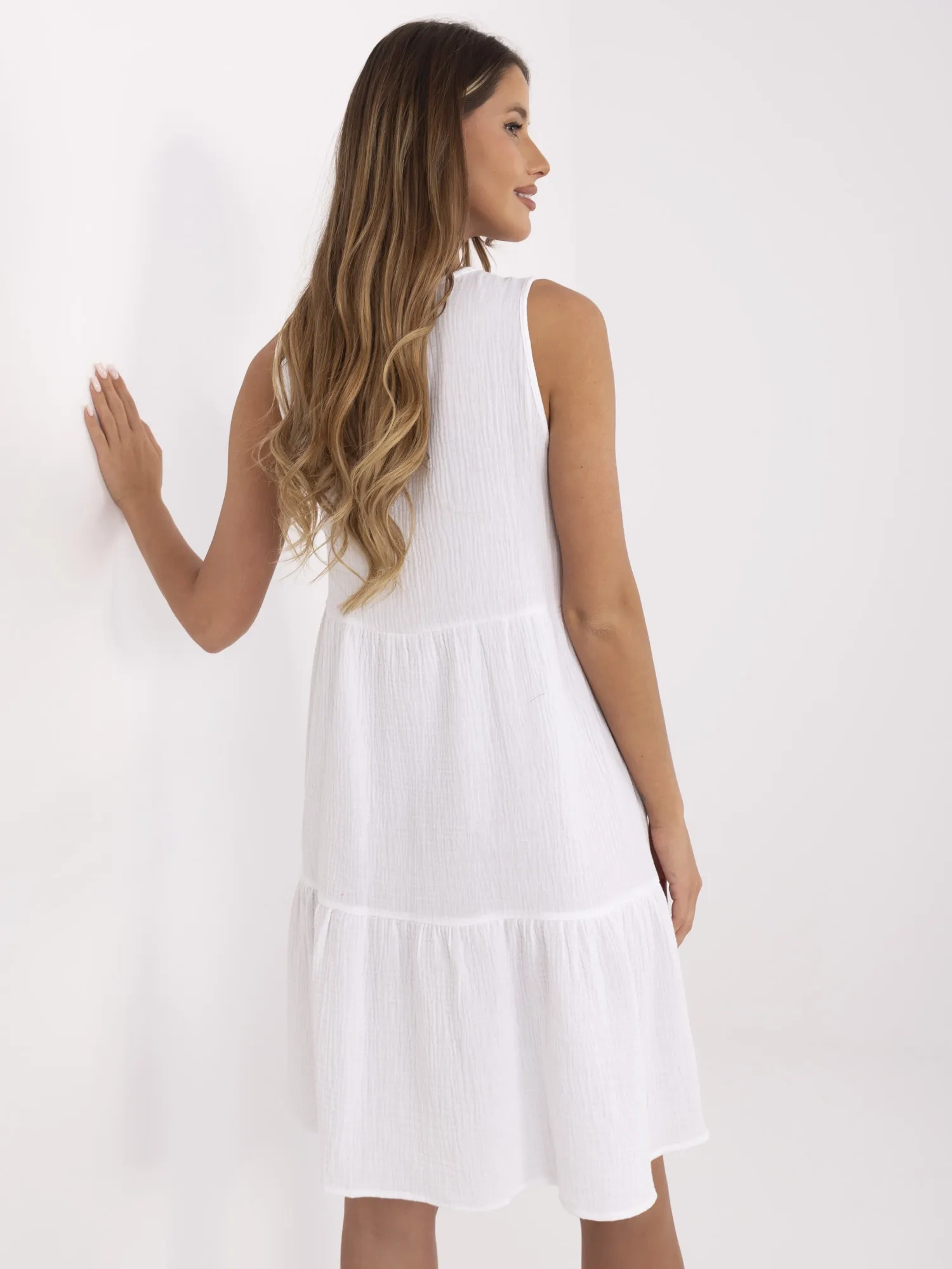 White muslin dress with ruffle SUBLEVEL.