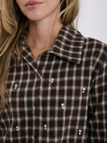 Brown women's checkered shirt with decorative stones.