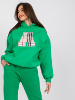 Grüne Sweatjacke mit Aufnäher und Kapuze Felicja.