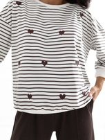 Brown cotton blouse with 3/4 sleeves.