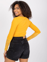 Jasnopomarańczowa prążkowana bluzka z koronką Beatrice RUE PARIS