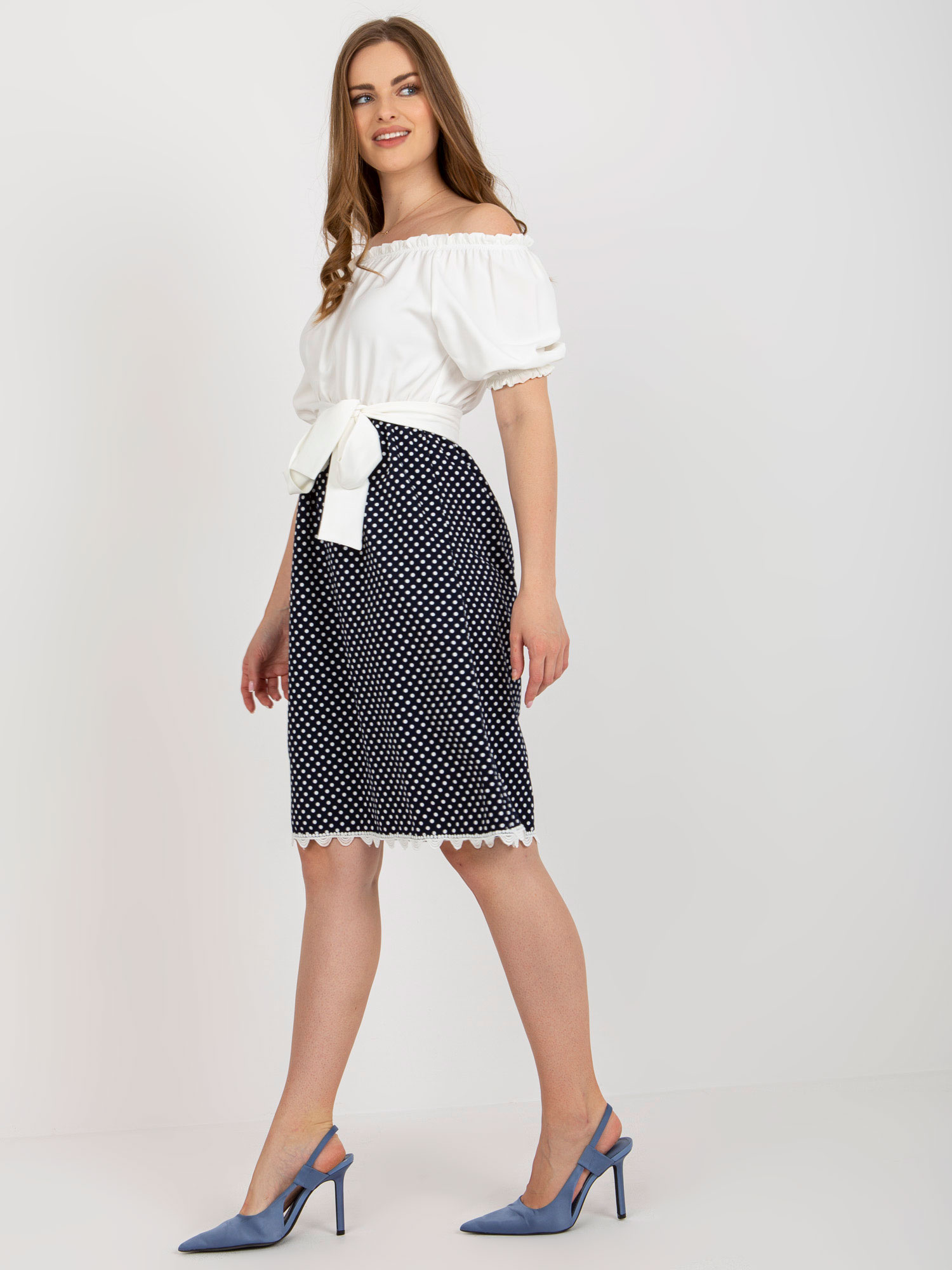 Hurt Ecru-navy cocktail dress off-the-shoulder with a belt.