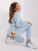 Hurt Jasnoniebiesko-fluo pomarańczowy damski komplet dresowy