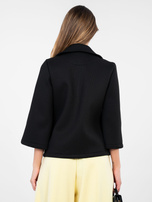 Black foam coat with pockets.