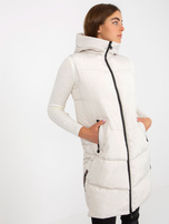 Hurtownia Kremowa długa kamizelka puchowa z kapturem