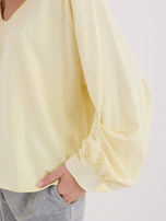 Jasnożółta bluzka oversize z bufiastym rękawem 
