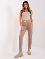 Hurt Ciemnobeżowe spodnie dresowe z troczkami