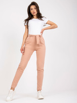 Beżowe spodnie z materiału z kieszeniami RUE PARIS