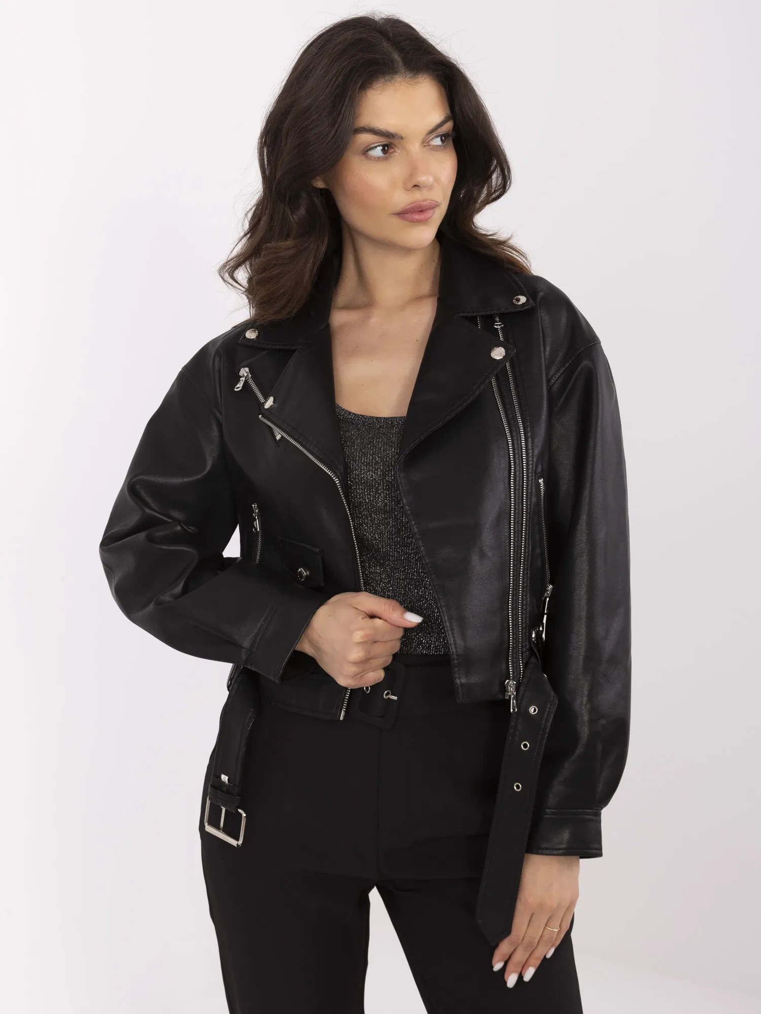 Black women's biker jacket with a belt.