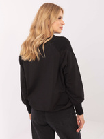 Schwarzes Baumwollshirt mit Applikation.