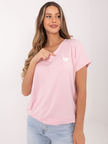 Jasnoróżowa damska bluzka oversize z krótkim rękawem