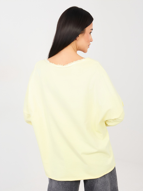 Jasnożółta bluzka overssize z wstawkami z satyny