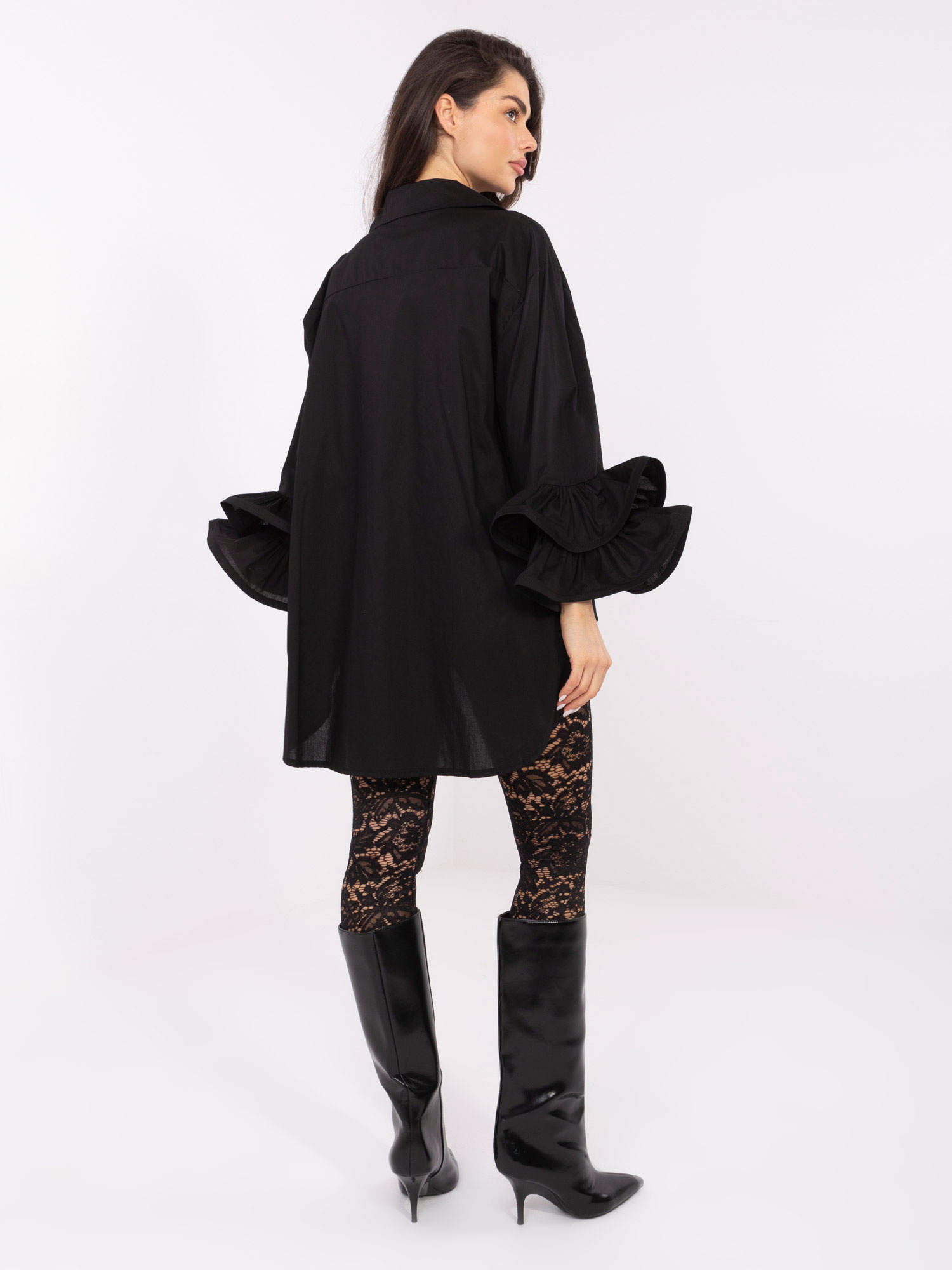 Black long shirt with flared sleeves.