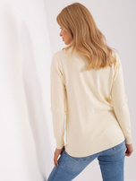 Hurtownia Jasnobeżowy damski sweter klasyczny we wzory