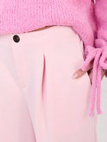 Jasnoróżowe dresowe spodnie ze ściągaczami