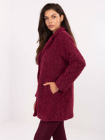 Burgundy short coat with a fluffy effect.